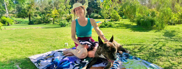 Woman having a picnic outside in the sun 