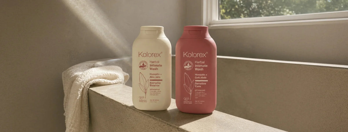 Two bottles of Kolorex Intimate Wash on a windowsill with sunlight streaming in.