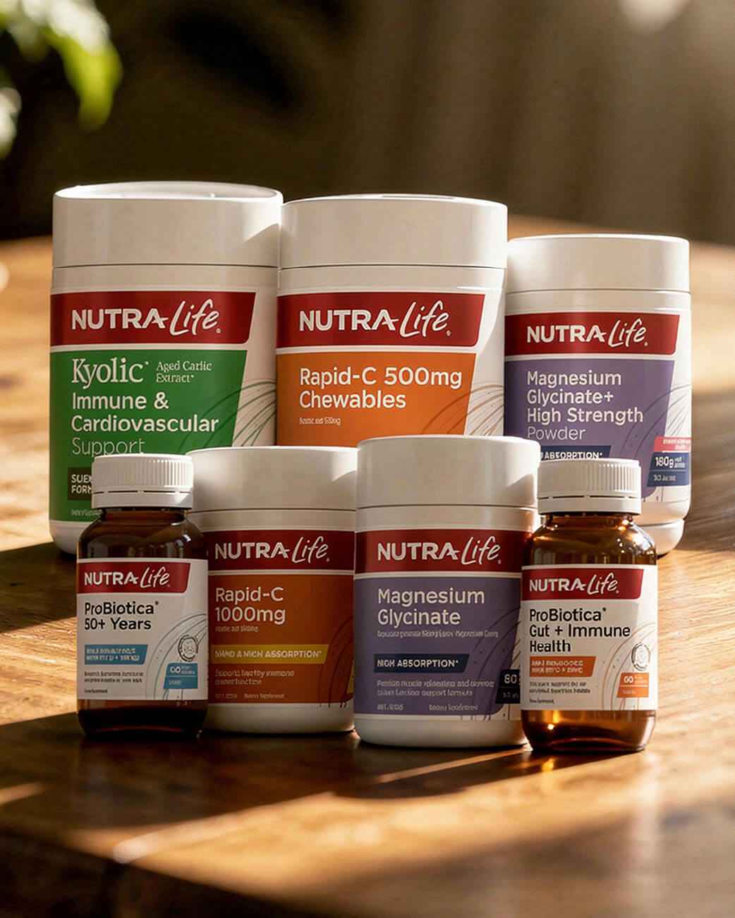 Collection of Nutra Life supplement containers on a kitchen counter.
