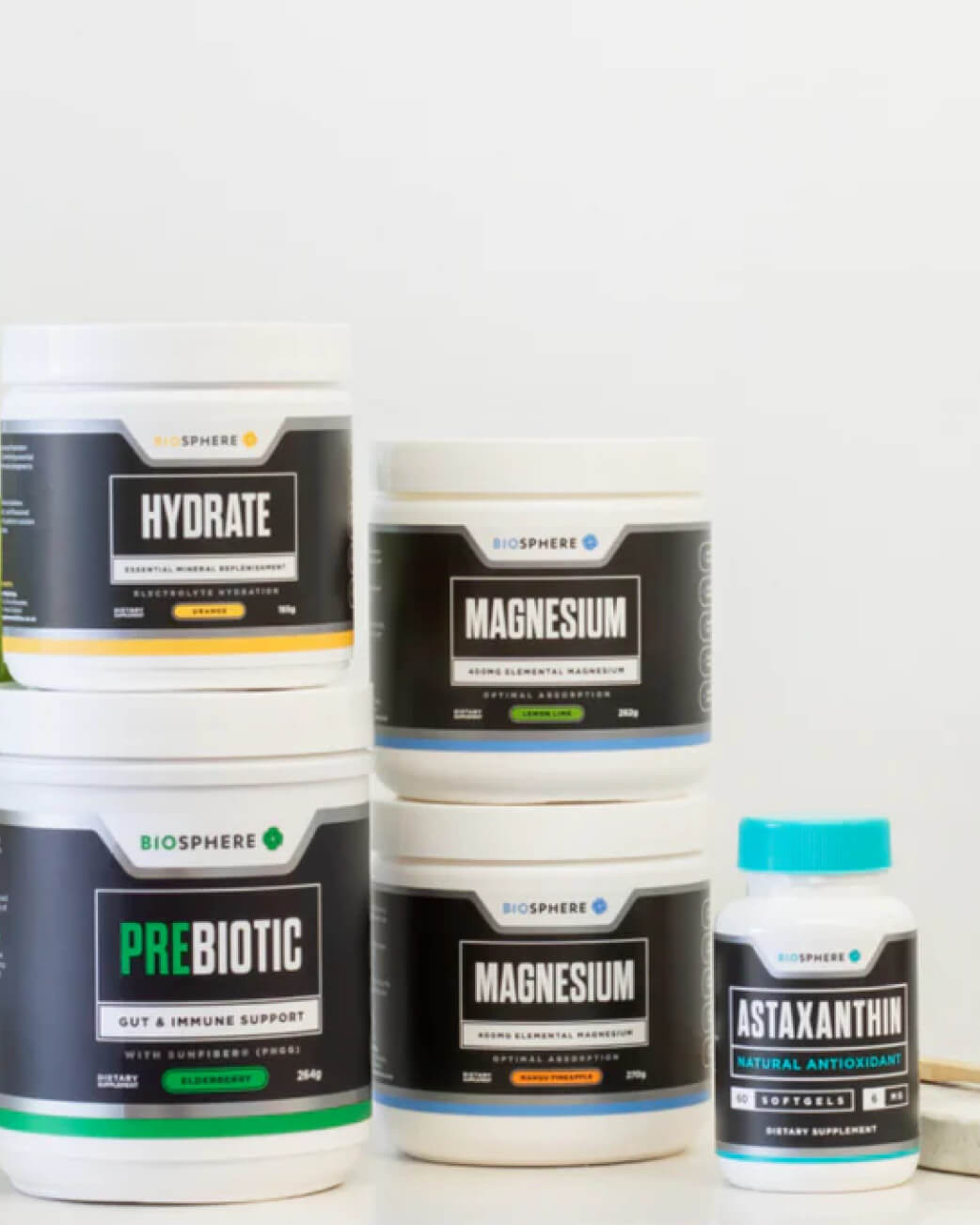 Collection of supplement containers with labels on a white background