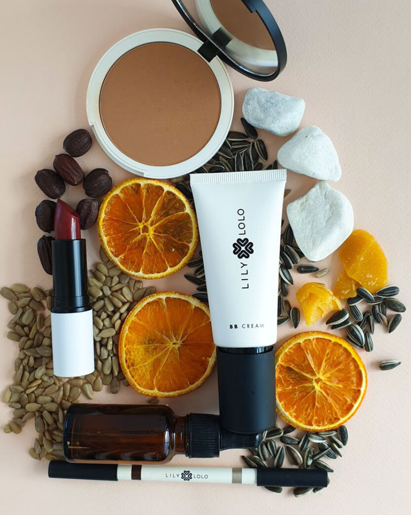 Lily Lolo cosmetic products on top of seeds.