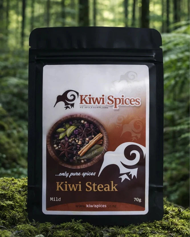 A pack of Kiwi Spices Kiwi Steak seasoning in a forest background.