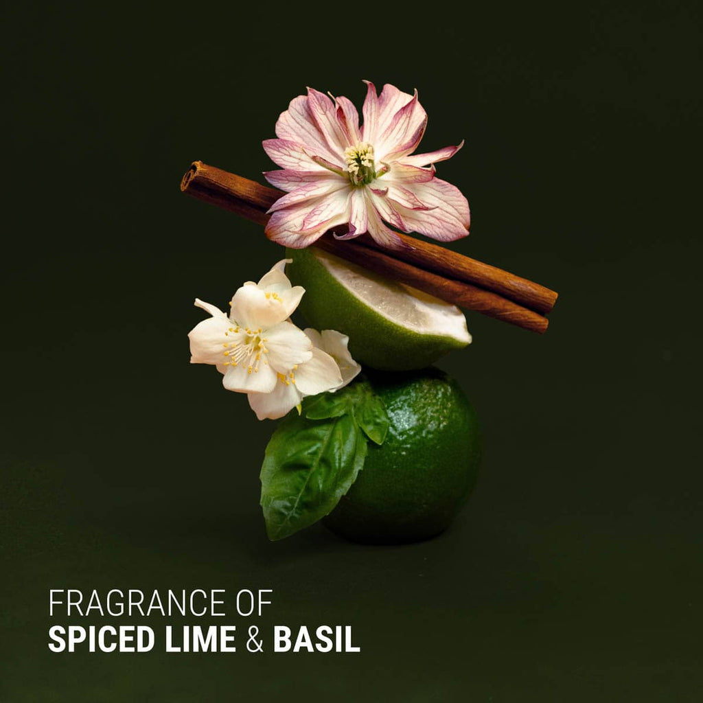 Spiced lime and basil with flowers on a dark background.