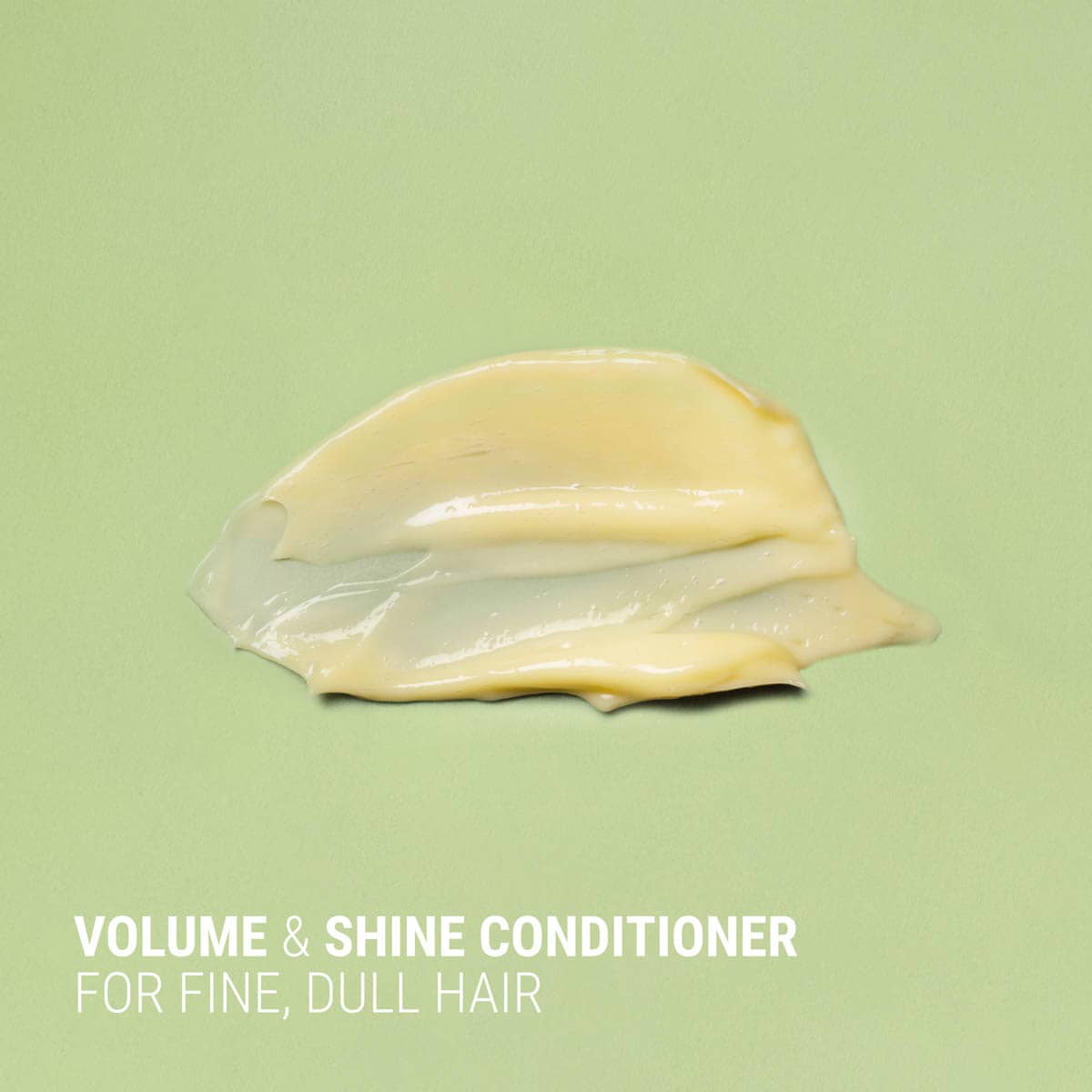 Volume and shine conditioner on a green background with text.