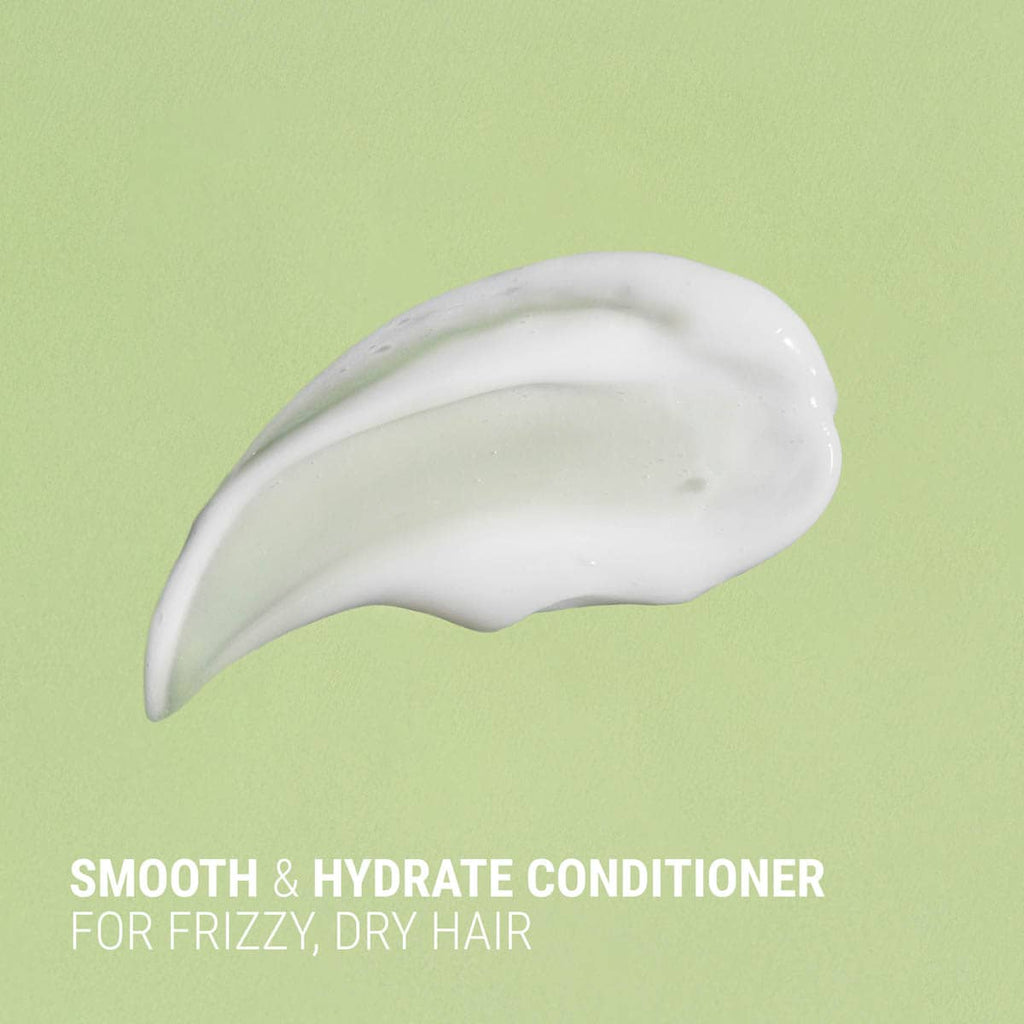 White conditioner smear on a green background with text 'Smooth & Hydrate Conditioner for Frizzy, Dry Hair'.