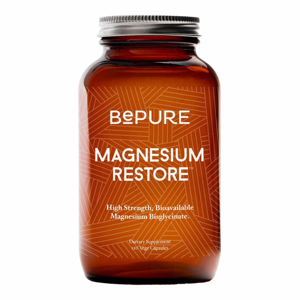 Brown supplement bottle labelled 'BePure Magnesium Restore' 120 vege capsules on a white background