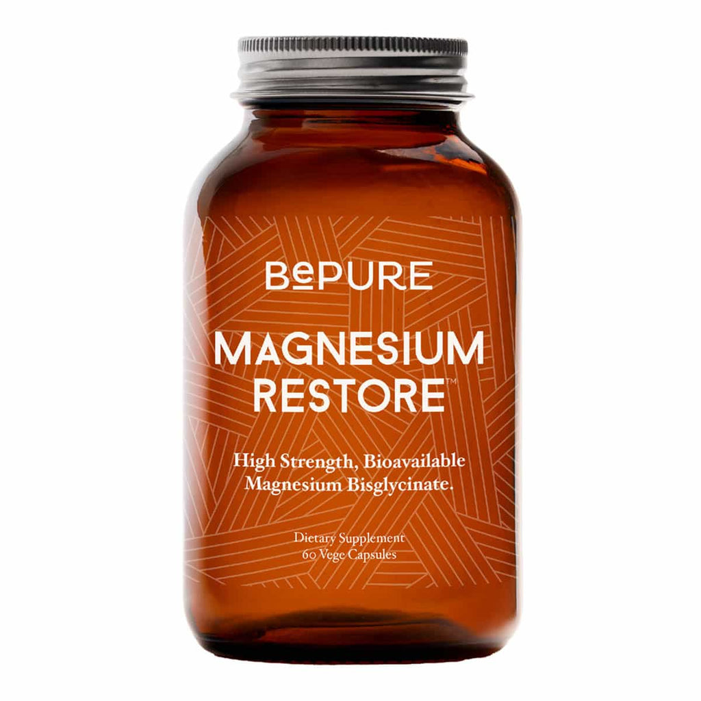 Brown supplement bottle labelled 'BePure Magnesium Restore' with 60 vege capsules on a white background.