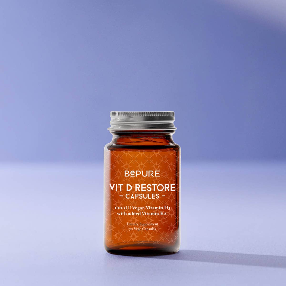 Bottle of Bepure Vit D Restore capsules on a light purple background