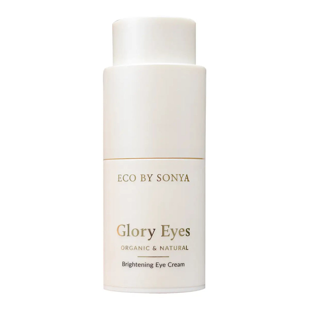 A white cylindrical bottle of Eco By Sonya Glory Eyes Brightening Eye Cream, featuring gold lettering and a thin gold horizontal line on a clean white background.