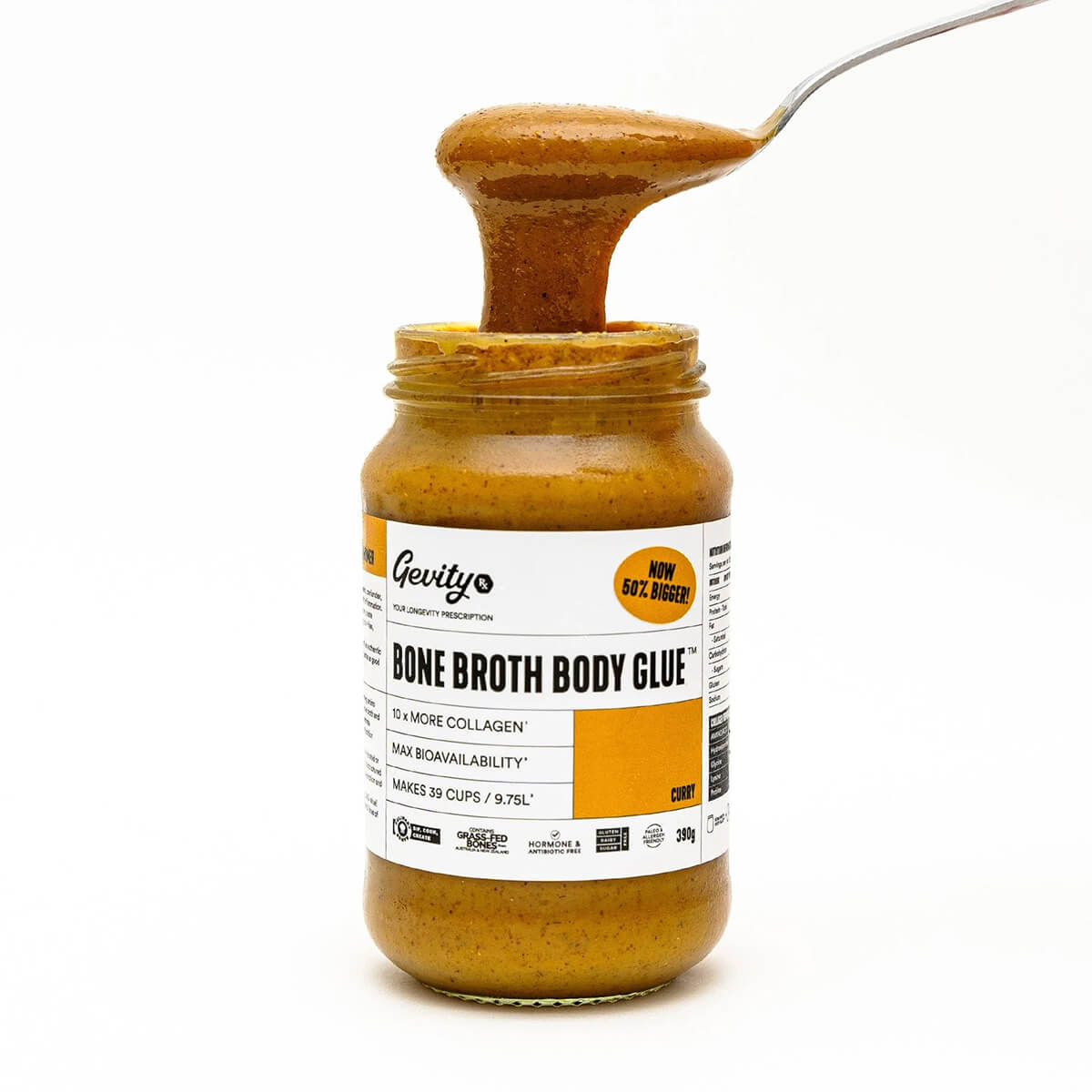 Jar of 'Bone Broth Body Glue' with a spoonful of the product on a white background.