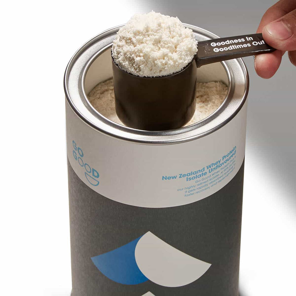Container of New Zealand Whey Protein Isolate with a scoop of powder.