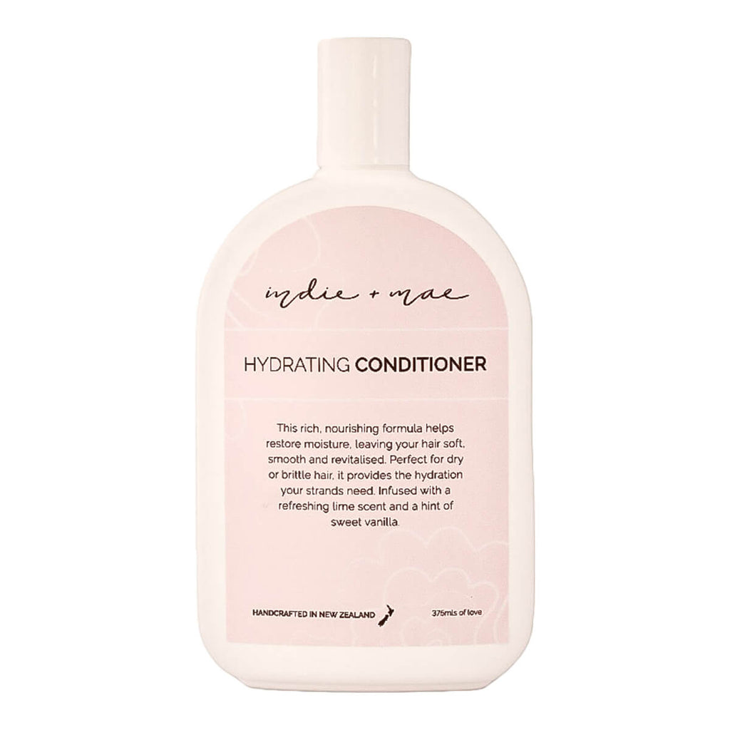 A 300ml bottle of Indie + Mae Hydrating Conditioner, featuring a soft blush pink label on a white bottle.