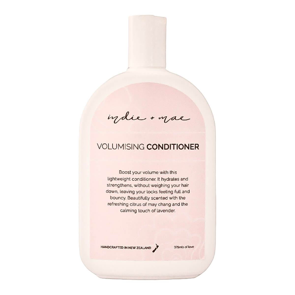 A 375ml bottle of Indie + Mac Volumising Conditioner, featuring a soft pink and white design with black text.