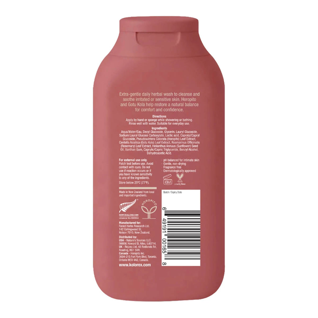 Back view of pink bottle of herbal intimate wash showing ingredients & directions.