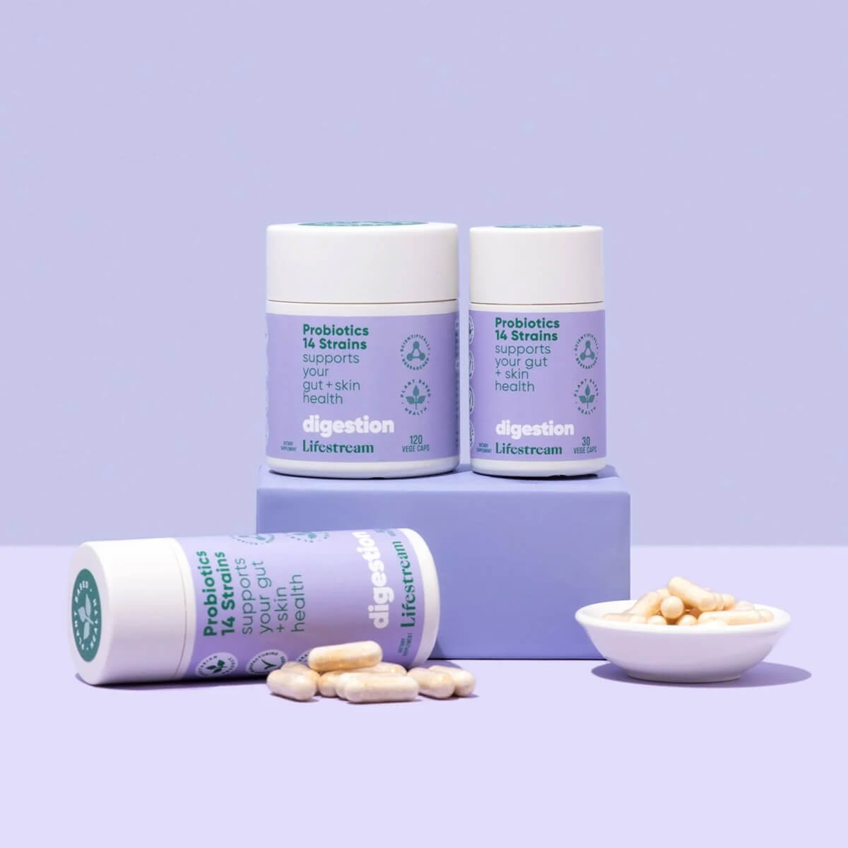 Supplement products on a purple background.