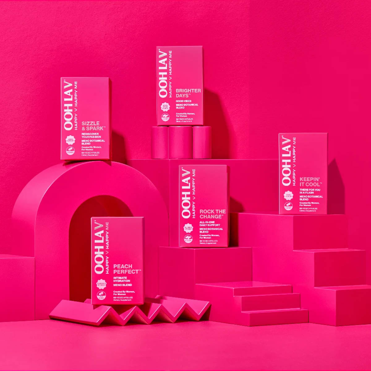 Ooh La V menopause products all staged on a pink architectural background.
