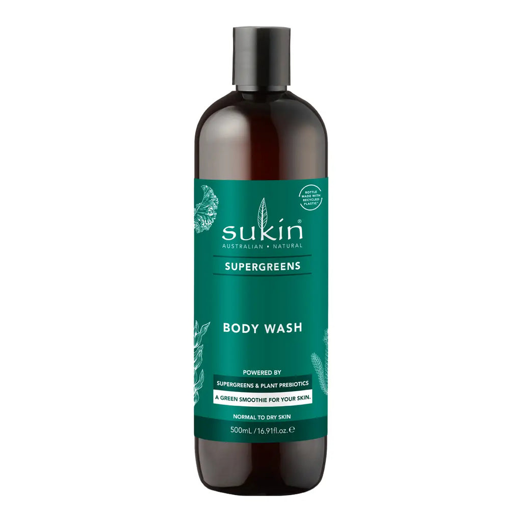 A 500ml bottle of Sukin Supergreens Body Wash, featuring a dark amber-brown translucent bottle and a teal green label with white text, set against a plain white background.