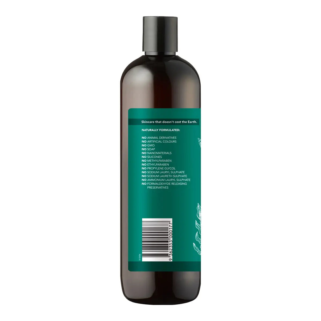 A dark amber-brown bottle with a black cap and a teal product information label showing text and a barcode, isolated on a white background.