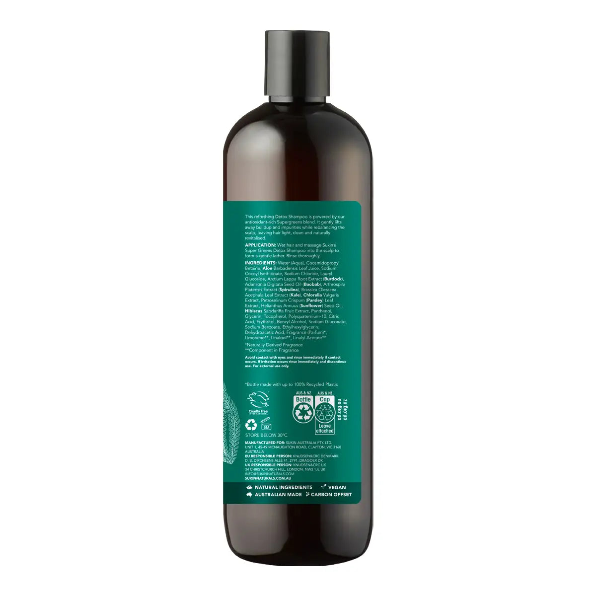 A dark amber bottle with a black cap and a green label showing the back instructions and ingredients, isolated on a white background.