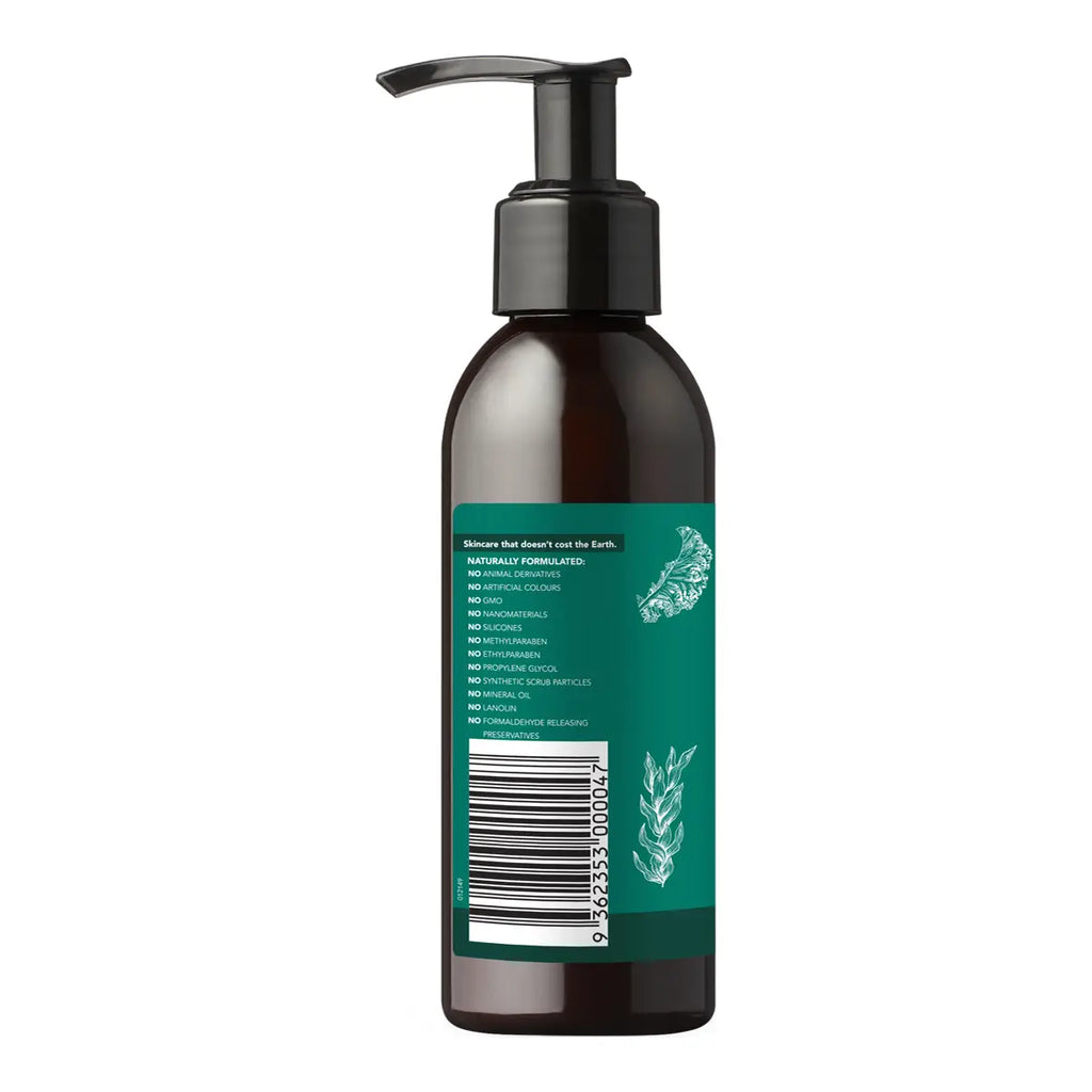 A dark amber brown pump bottle showing the back side with a green label, barcode, and white text, set against a plain white background.