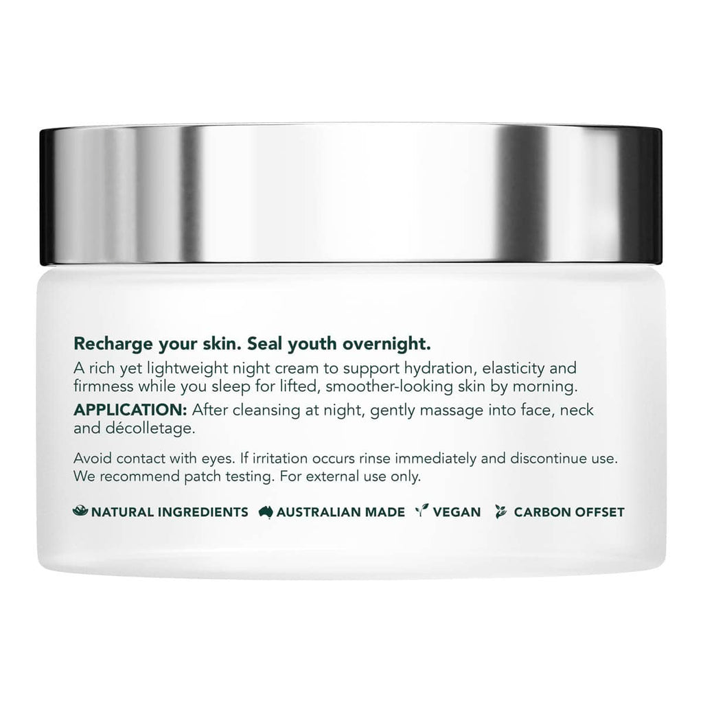 Skincare jar with silver lid and white body on a white background.