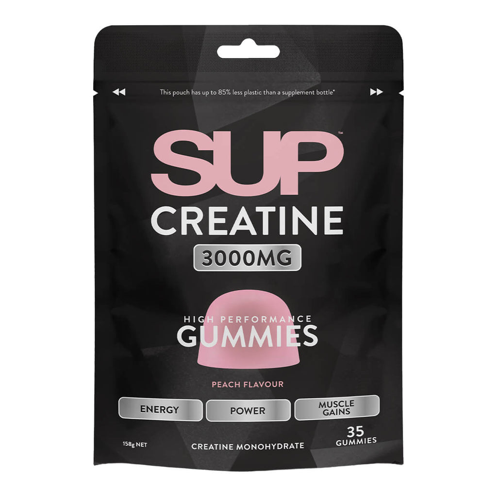 A black stand-up pouch of SUP Creatine 3000mg gummies, peach flavor, with pink and white text.