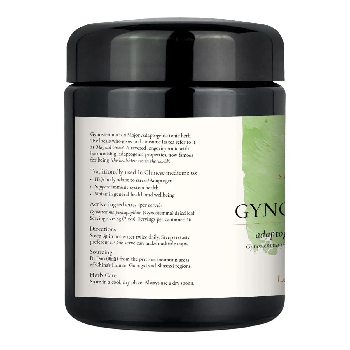 A black herbal tea jar with a black lid and a white label featuring green accents and text.
