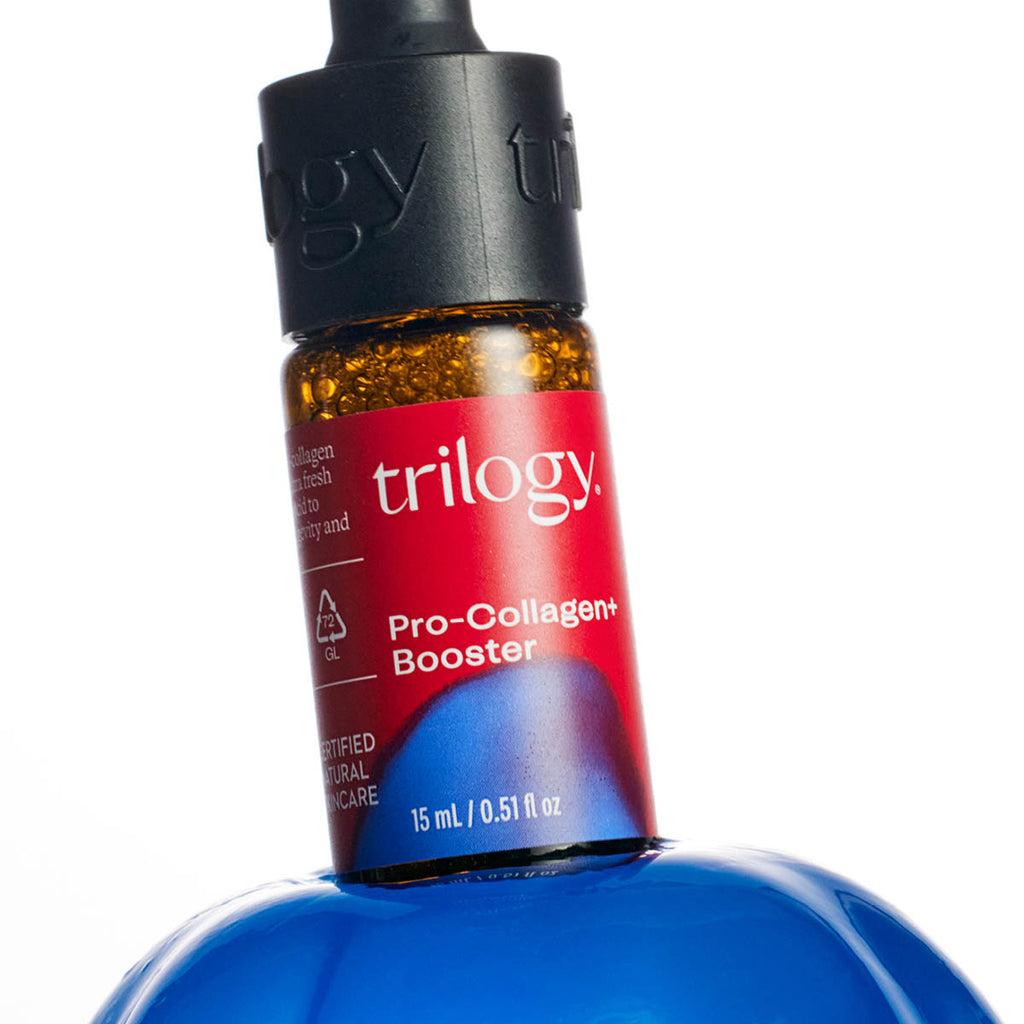 Trilogy Pro-Collagen Booster bottle with blue base and red label on a white background