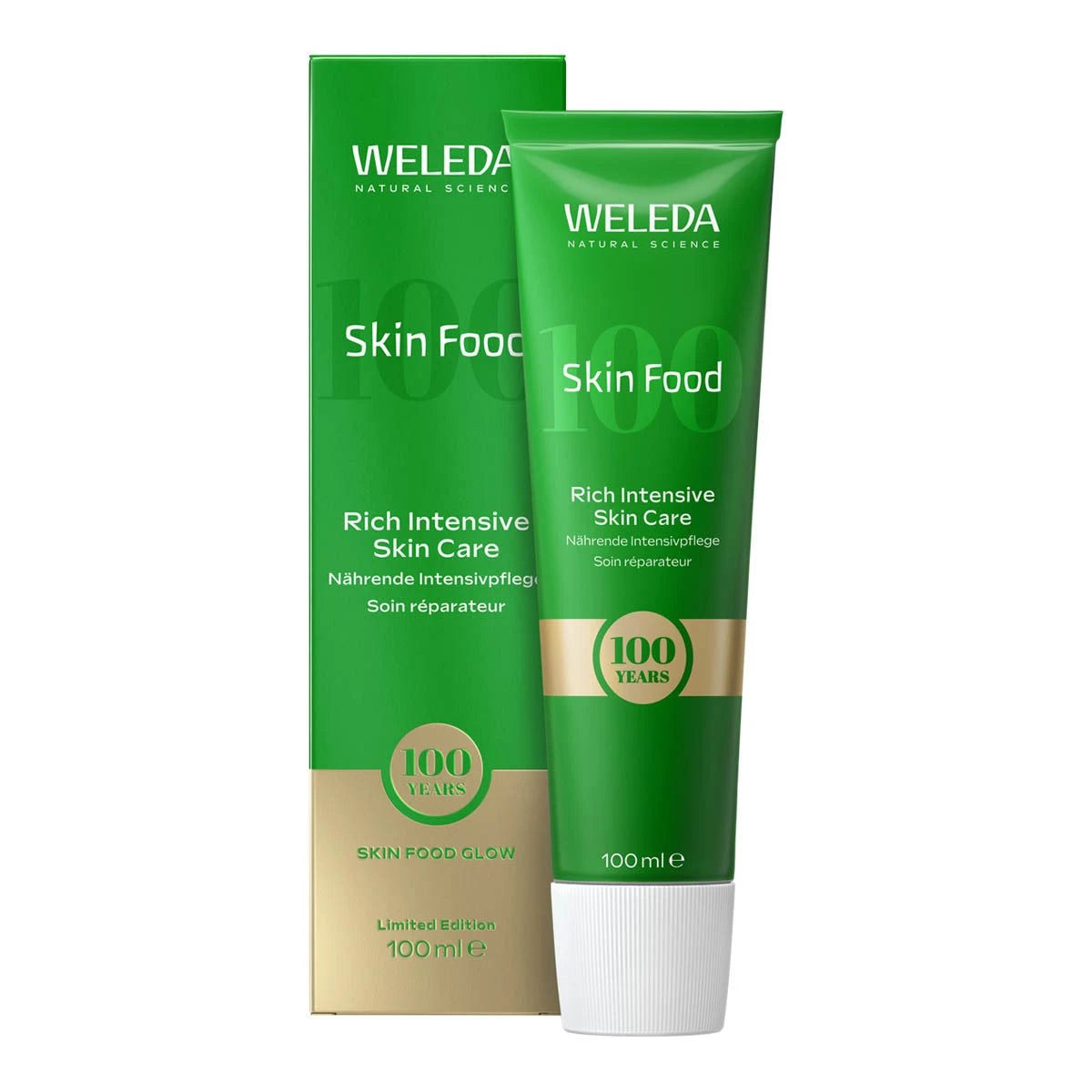 A green tube of Weleda Skin Food Rich Intensive Skin Care next to its matching green and gold packaging box, set against a plain white background.