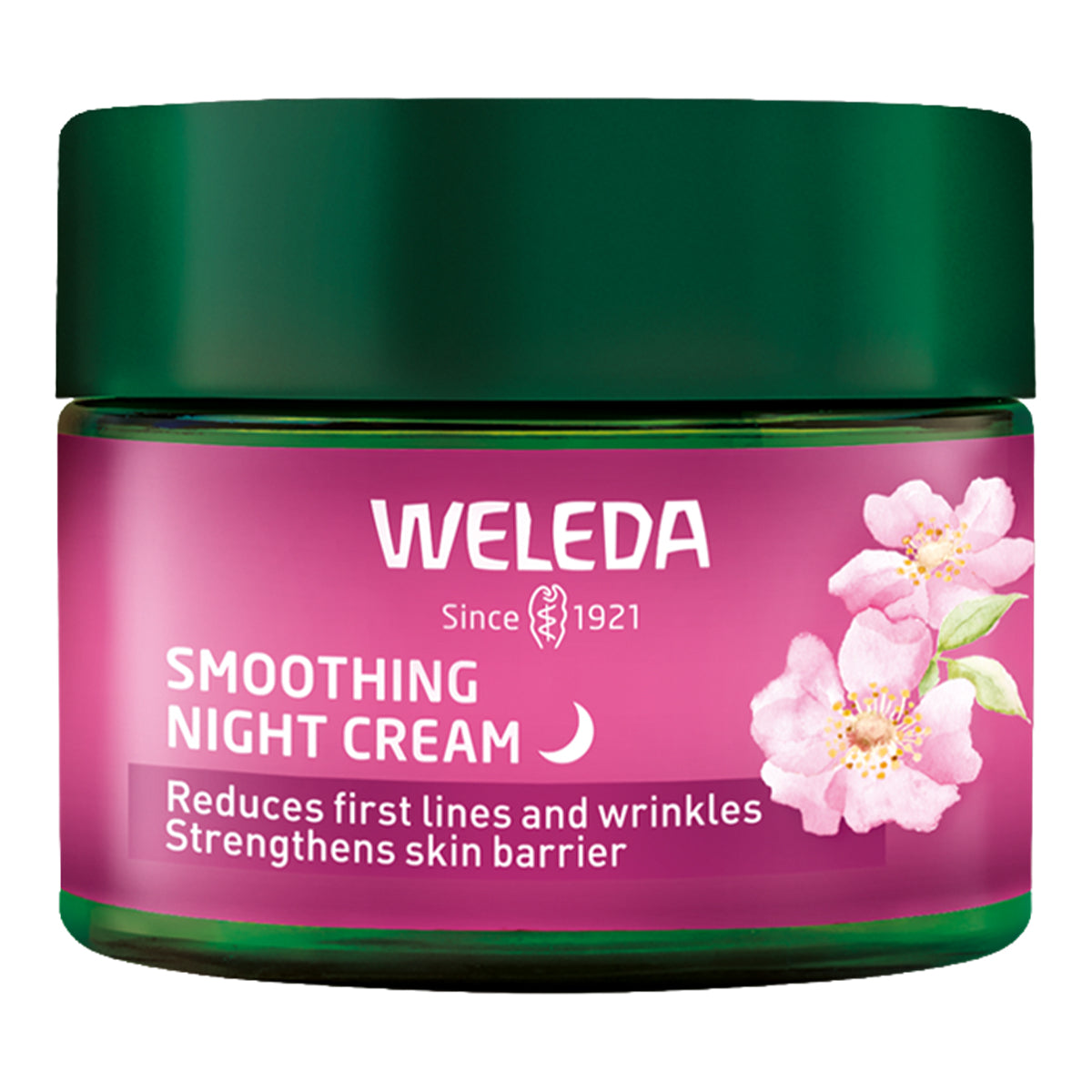 Weleda smoothing night cream jar with pink label and green lid on a white background.