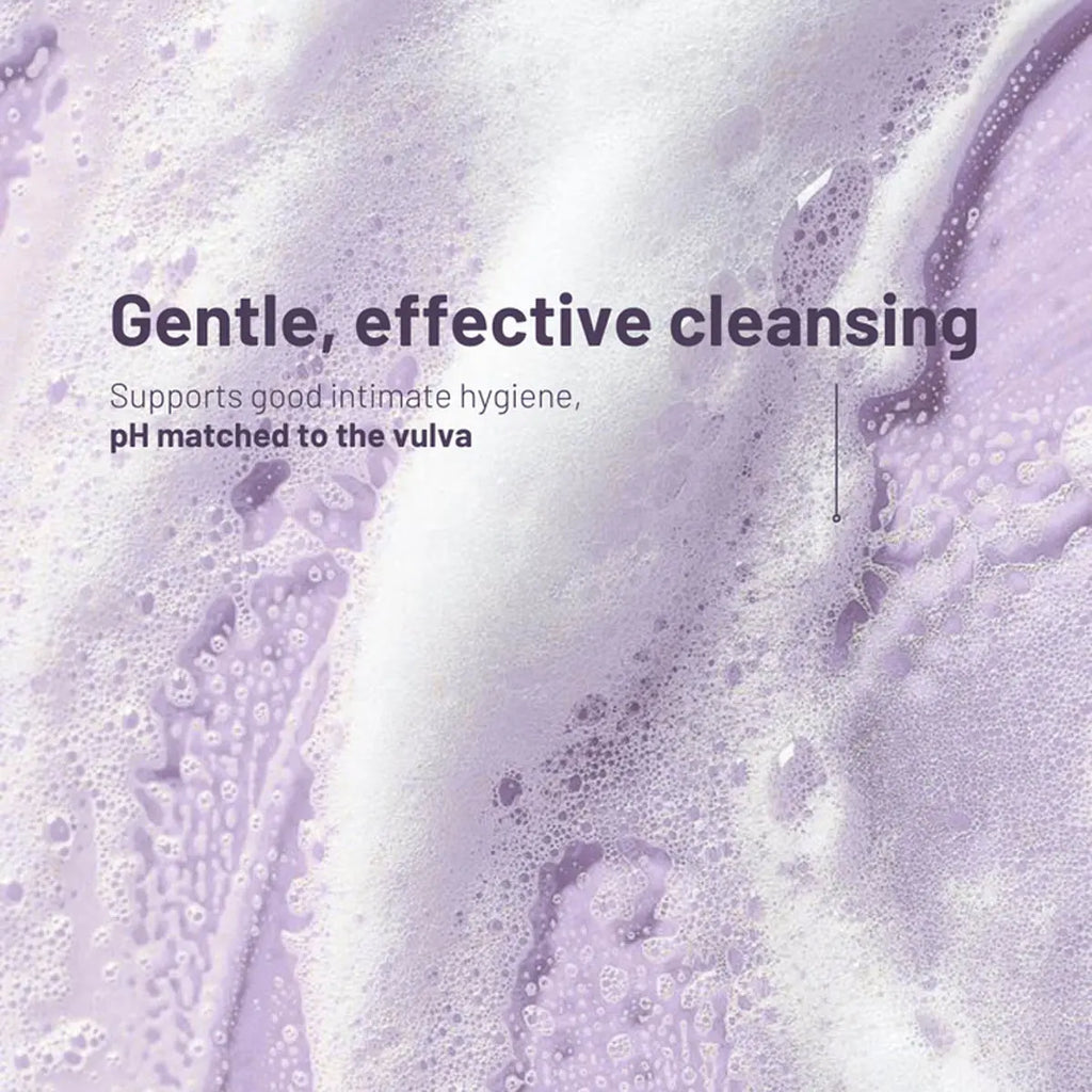 Purple liquid with bubbles and text about gentle cleansing and pH matching to the vulva.